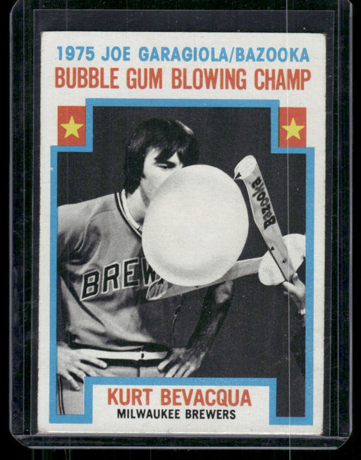 1976 Topps #564 Bubble Gum Blowing Champ (Kurt Bevacqua)