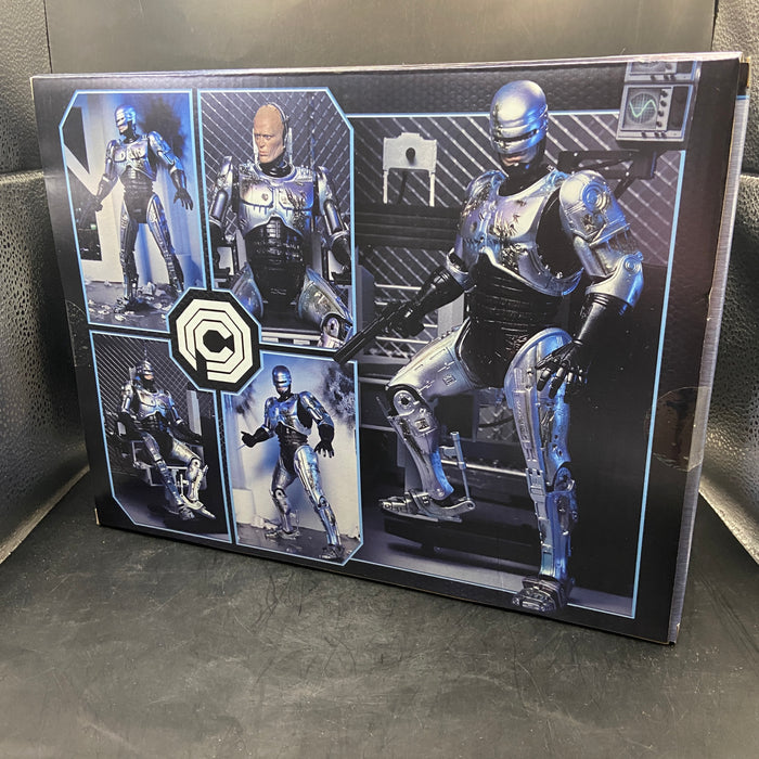 NECA Ultimate Robo Cop Battle Damaged with Chair